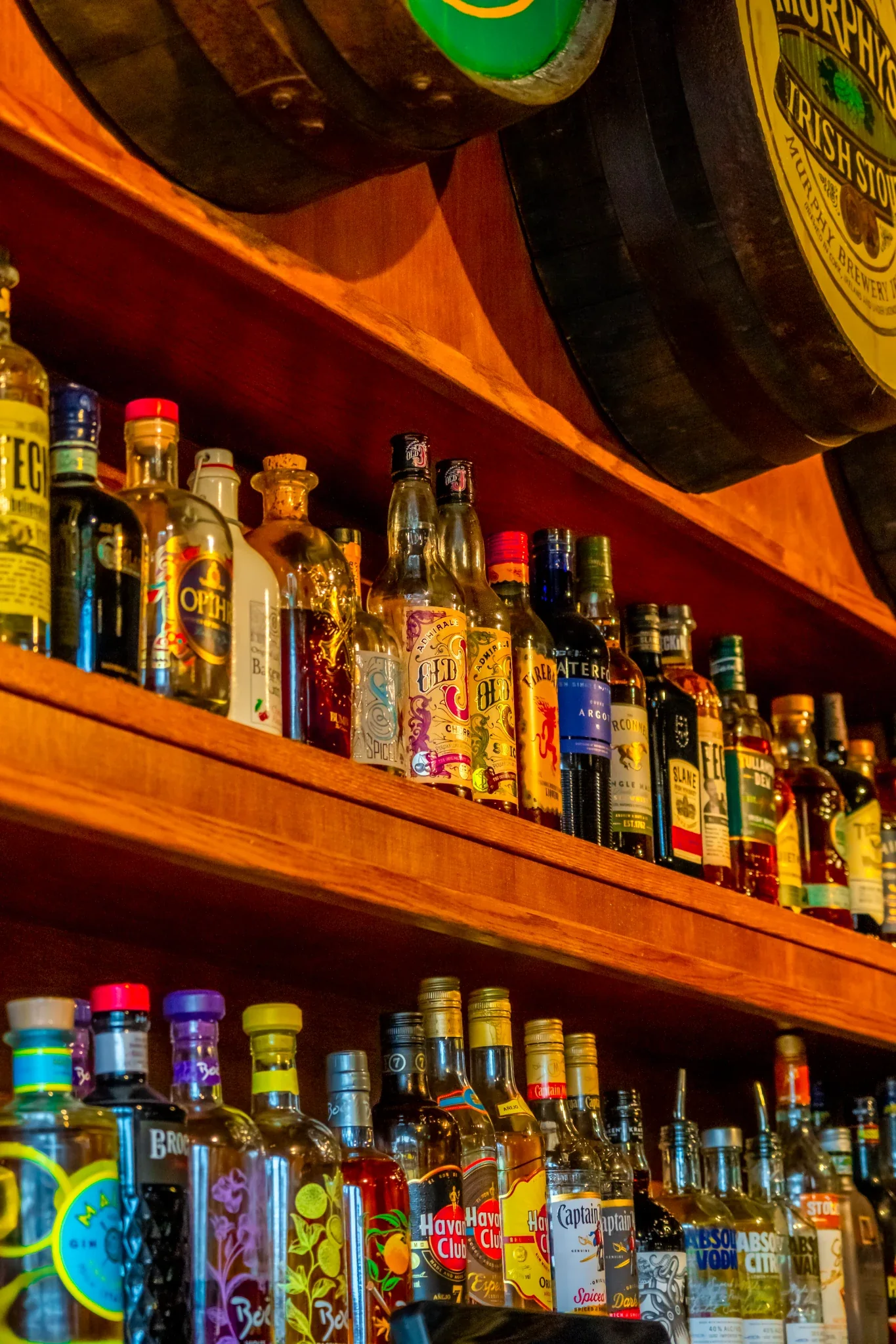 Back bar at Penelope O'Shea's with spirits and Irish whiskey barrels