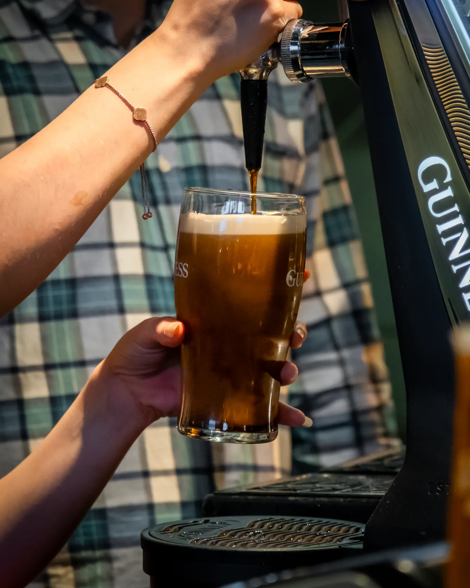 A pint of Guinness being poured at Penelope O'Shea's